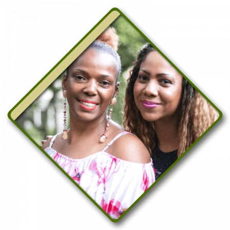 Section-8-Image-(3-11-21) Two women, smiling together in a diamond frame.